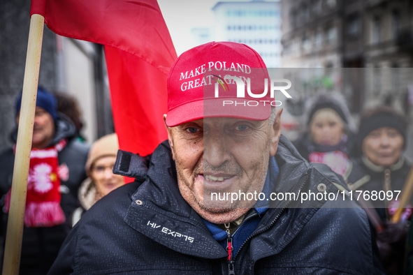 A man wears 'Make Poland Great Again' cap while attending Independence March celebrating the 106 anniversary of Poland regaining independenc...