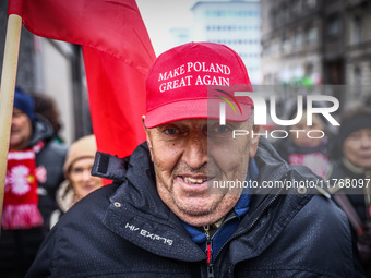 A man wears 'Make Poland Great Again' cap while attending Independence March celebrating the 106 anniversary of Poland regaining independenc...