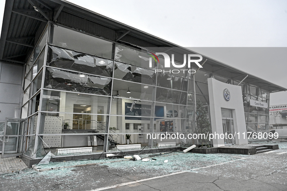 A car dealership where a 71-year-old guard dies is damaged by an overnight Russian air strike in Zaporizhzhia, Ukraine, on November 11, 2024...