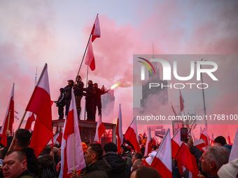 People attend Independence March celebrating the 106 anniversary of Poland regaining independence. Warsaw, Poland on 11 November, 2024. Tens...