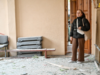 A woman looks with sadness at a gym in the sports complex of the Zaporizhzhia Polytechnic National University, which is damaged by an overni...