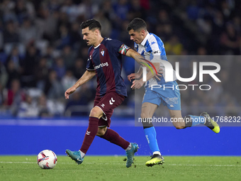 Diego Villares of RC Deportivo de La Coruna competes for the ball with Sergio Alvarez of SD Eibar during the LaLiga Hypermotion match betwee...