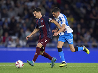 Diego Villares of RC Deportivo de La Coruna competes for the ball with Sergio Alvarez of SD Eibar during the LaLiga Hypermotion match betwee...