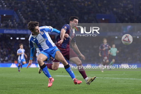 Xeber Alkain of SD Eibar competes for the ball with Rafa Obrador of RC Deportivo de La Coruna during the LaLiga Hypermotion match between RC...