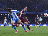 Xeber Alkain of SD Eibar competes for the ball with Rafa Obrador of RC Deportivo de La Coruna during the LaLiga Hypermotion match between RC...