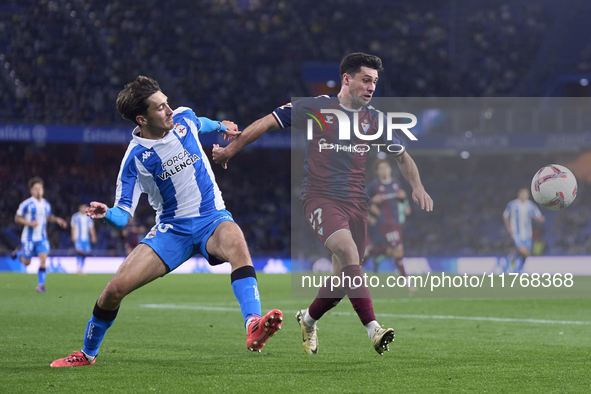 Xeber Alkain of SD Eibar competes for the ball with Rafa Obrador of RC Deportivo de La Coruna during the LaLiga Hypermotion match between RC...