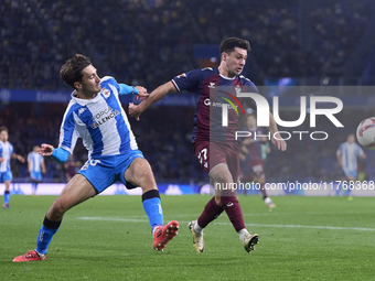 Xeber Alkain of SD Eibar competes for the ball with Rafa Obrador of RC Deportivo de La Coruna during the LaLiga Hypermotion match between RC...