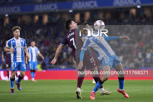 Xeber Alkain of SD Eibar competes for the ball with Rafa Obrador of RC Deportivo de La Coruna during the LaLiga Hypermotion match between RC...