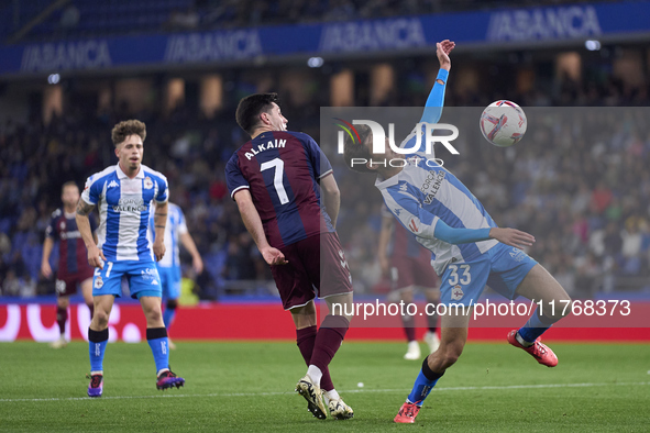 Xeber Alkain of SD Eibar competes for the ball with Rafa Obrador of RC Deportivo de La Coruna during the LaLiga Hypermotion match between RC...