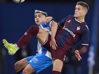 Jose Corpas of SD Eibar competes for the ball with Yeremay Hernandez of RC Deportivo de La Coruna during the LaLiga Hypermotion match betwee...