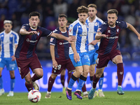 Xeber Alkain of SD Eibar competes for the ball with Mario Soriano of RC Deportivo de La Coruna during the LaLiga Hypermotion match between R...