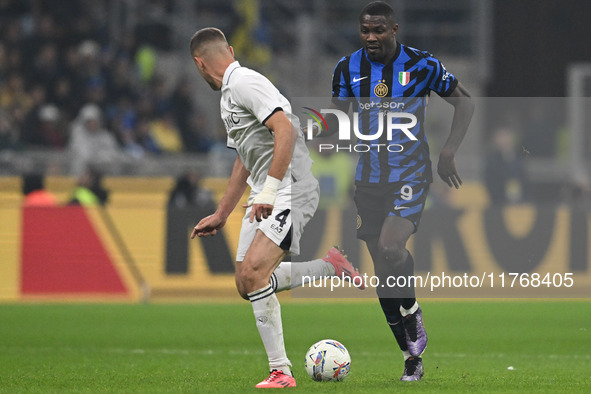 Marcus Thuram of Inter FC participates in the Italian Serie A football match between Inter FC and SSC Napoli in Milan, Italy, on November 10...