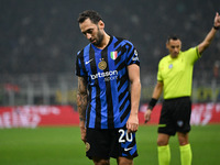 Hakan Calhanoglu of Inter FC reacts during the Italian Serie A football match between Inter FC and SSC Napoli at Giuseppe Meazza San Siro St...