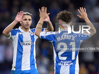 Mario Soriano of RC Deportivo de La Coruna celebrates with Yeremay Hernandez after scoring his team's first goal during the LaLiga Hypermoti...