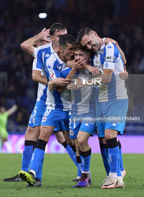 Mario Soriano of RC Deportivo de La Coruna celebrates with his teammates after scoring his team's first goal during the LaLiga Hypermotion m...