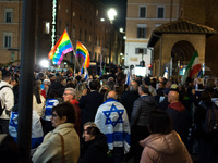 People hold Israeli flags as they attend a demonstration against anti-Semitic violence at Largo Argentina in Rome, Italy, on November 11, 20...