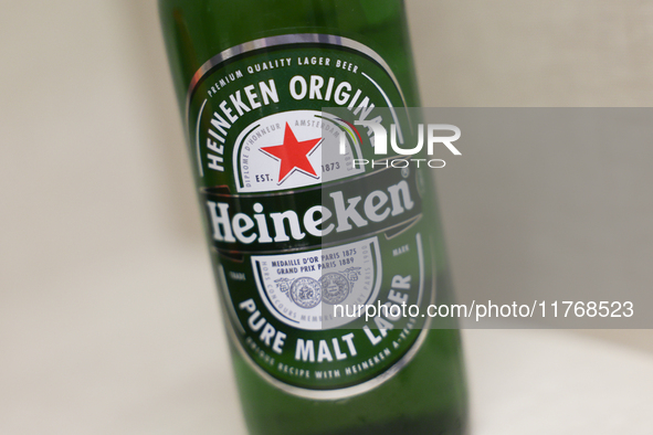 Heineken bottle is seen in this illustration photo taken in Berlin, Germany on November 11, 2024. 