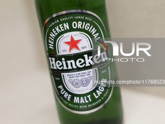 Heineken bottle is seen in this illustration photo taken in Berlin, Germany on November 11, 2024. (