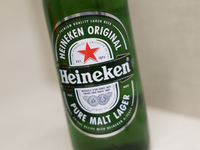 Heineken bottle is seen in this illustration photo taken in Berlin, Germany on November 11, 2024. (