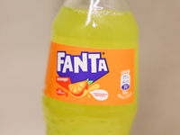 Fanta bottle is seen in this illustration photo taken in Berlin, Germany on November 11, 2024. (