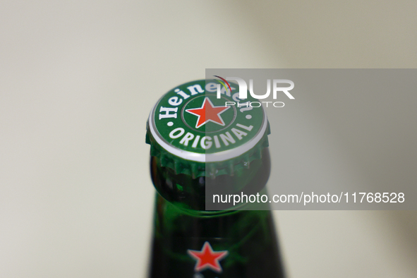 Heineken bottle is seen in this illustration photo taken in Berlin, Germany on November 11, 2024. 