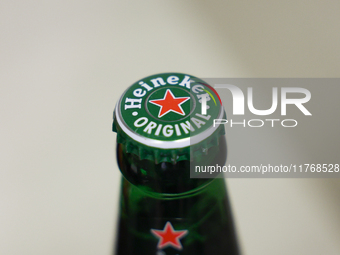 Heineken bottle is seen in this illustration photo taken in Berlin, Germany on November 11, 2024. (