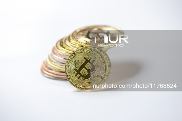 Bitcoin gift commemorative coins are displayed in Huai'an, Jiangsu province, China, on November 11, 2024. 