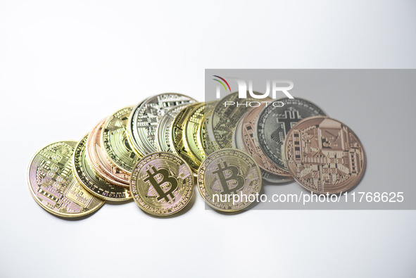 Bitcoin gift commemorative coins are displayed in Huai'an, Jiangsu province, China, on November 11, 2024. 