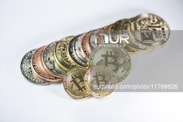 Bitcoin gift commemorative coins are displayed in Huai'an, Jiangsu province, China, on November 11, 2024. 