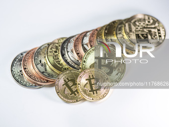 Bitcoin gift commemorative coins are displayed in Huai'an, Jiangsu province, China, on November 11, 2024. (