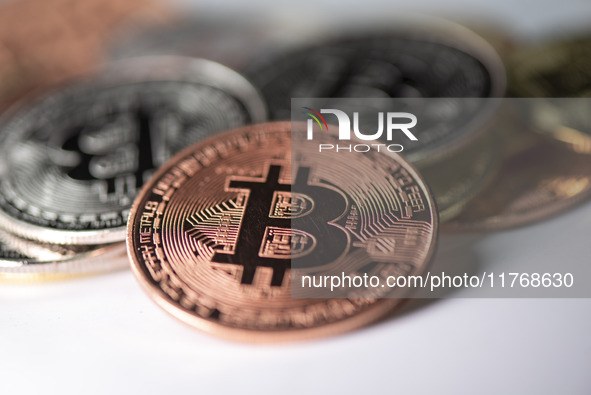 Bitcoin gift commemorative coins are displayed in Huai'an, Jiangsu province, China, on November 11, 2024. 