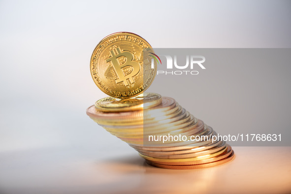 Bitcoin gift commemorative coins are displayed in Huai'an, Jiangsu province, China, on November 11, 2024. 