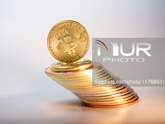 Bitcoin gift commemorative coins are displayed in Huai'an, Jiangsu province, China, on November 11, 2024. (