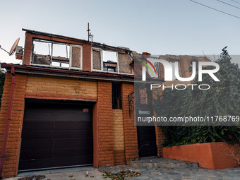 A residential building is damaged by Russian shelling in Kherson, Ukraine, on November 7, 2024. (