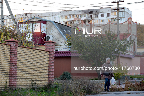 A local resident is seen on the street in Kherson, Ukraine, on November 7, 2024. 