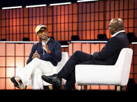 Pharrell Williams, an artist and entrepreneur, and Frank Cooper, CMO at Visa, are present on the center stage during the opening night of We...