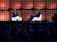 Pharrell Williams, an artist and entrepreneur, and Frank Cooper, CMO at Visa, are present on the center stage during the opening night of We...