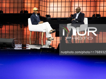 Pharrell Williams, an artist and entrepreneur, and Frank Cooper, CMO at Visa, are present on the center stage during the opening night of We...