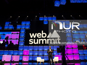 Pharrell Williams, an artist and entrepreneur, and Frank Cooper, CMO at Visa, are present on the center stage during the opening night of We...