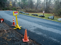 An area closed sign is on Old Forge Road in Orange County, New York, as wildfires burn along the New York and New Jersey border on November...