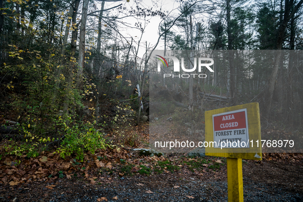 An area closed sign is on Old Forge Road in Orange County, New York, as wildfires burn along the New York and New Jersey border on November...