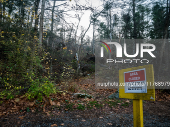 An area closed sign is on Old Forge Road in Orange County, New York, as wildfires burn along the New York and New Jersey border on November...