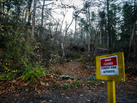 An area closed sign is on Old Forge Road in Orange County, New York, as wildfires burn along the New York and New Jersey border on November...