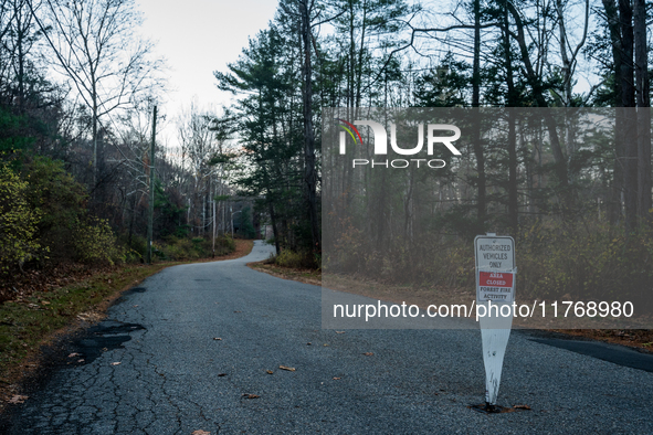 An area closed sign is on Old Forge Road in Orange County, New York, as wildfires burn along the New York and New Jersey border on November...