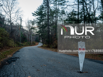 An area closed sign is on Old Forge Road in Orange County, New York, as wildfires burn along the New York and New Jersey border on November...