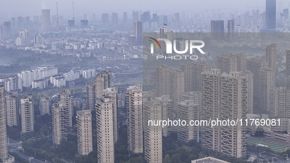 A photo taken in Huai'an, China, on November 12, 2024, shows residential buildings in the urban area of Huai'an City, East China's Jiangsu p...