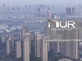 A photo taken in Huai'an, China, on November 12, 2024, shows residential buildings in the urban area of Huai'an City, East China's Jiangsu p...