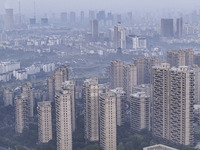 A photo taken in Huai'an, China, on November 12, 2024, shows residential buildings in the urban area of Huai'an City, East China's Jiangsu p...