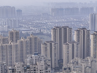 A photo taken in Huai'an, China, on November 12, 2024, shows residential buildings in the urban area of Huai'an City, East China's Jiangsu p...