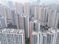 A photo taken in Huai'an, China, on November 12, 2024, shows residential buildings in the urban area of Huai'an City, East China's Jiangsu p...